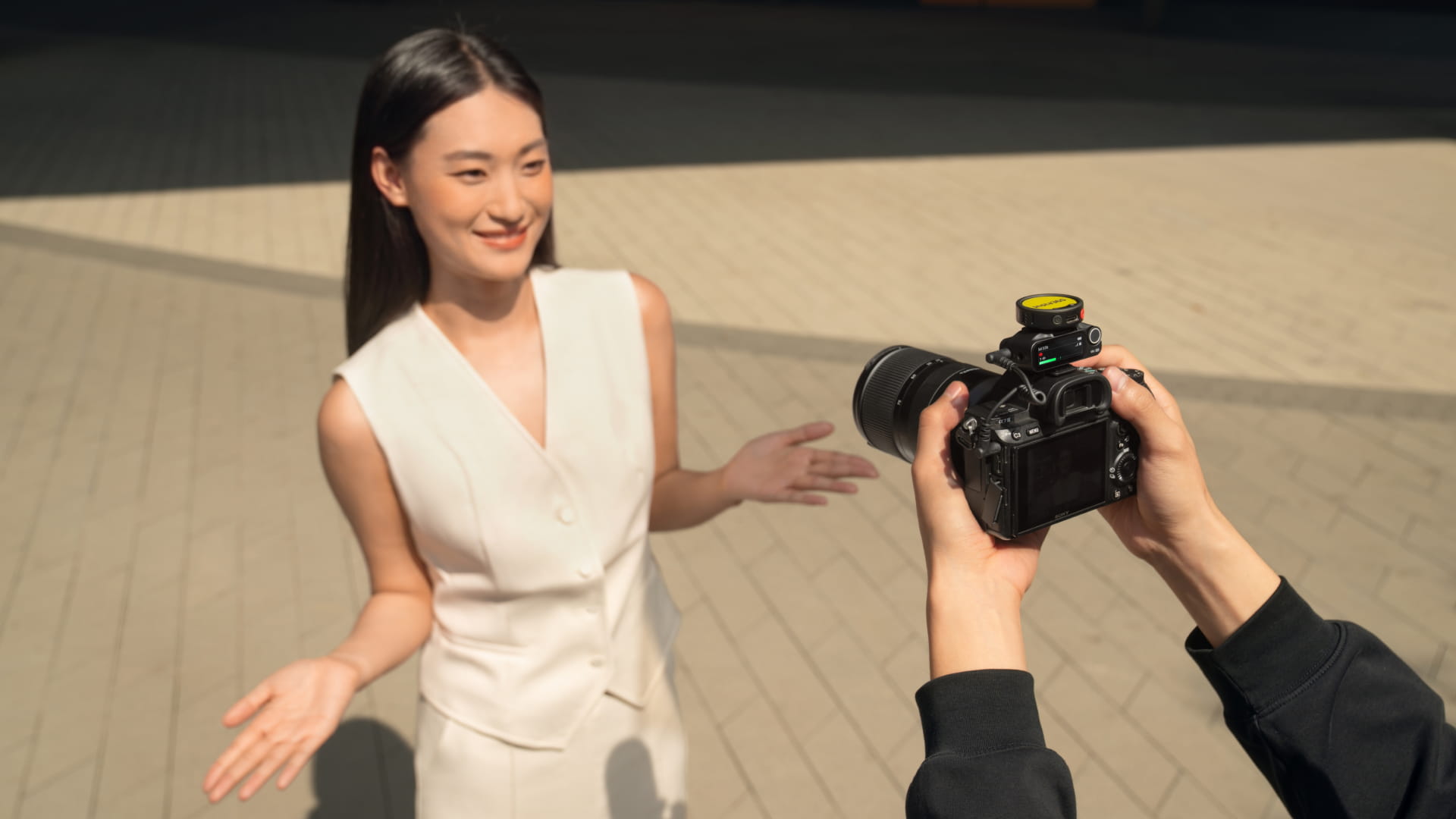 Insta360 Mic Pro transmitter mounted on a camera
